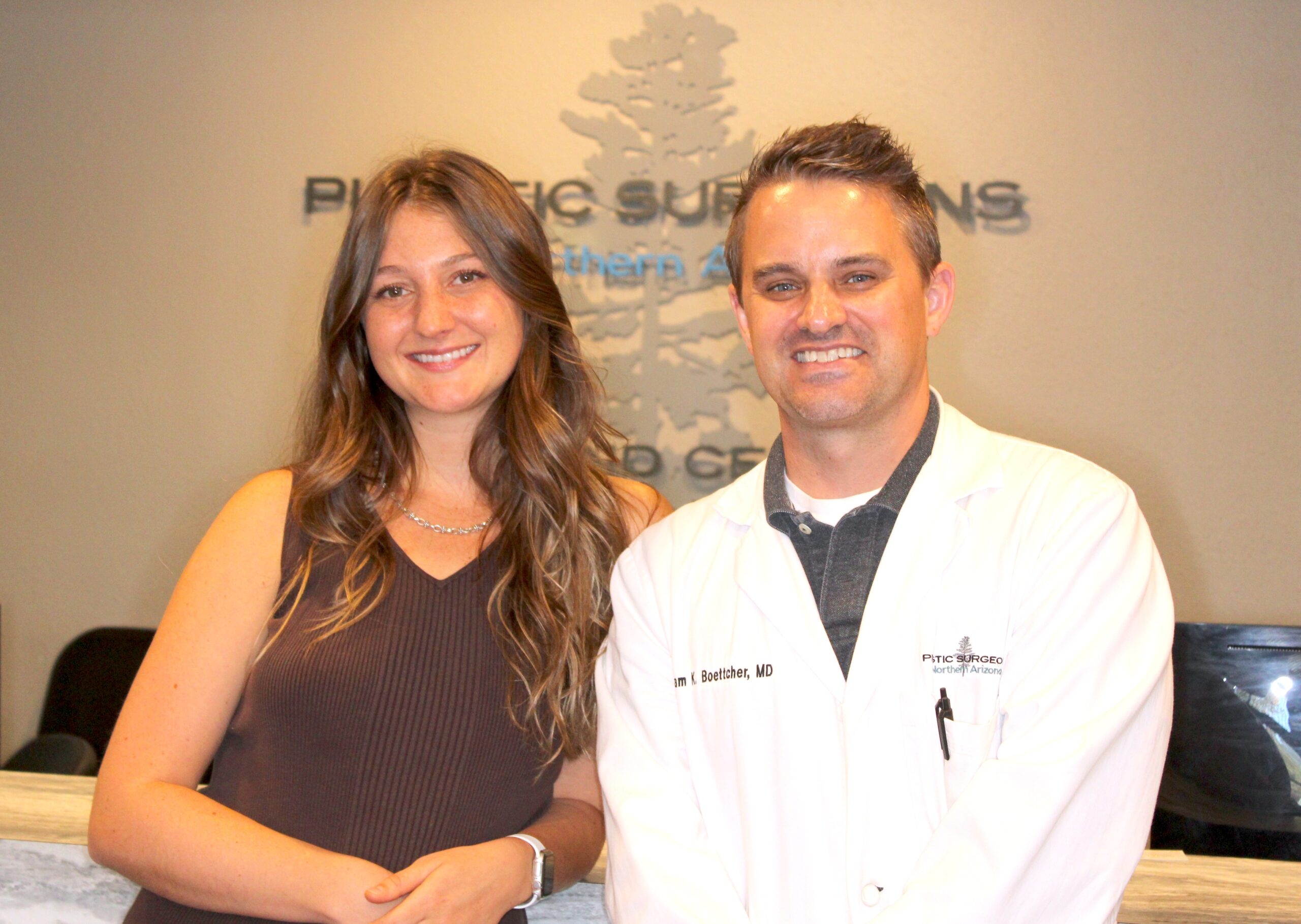 Breast cancer survivor Chenoa (left) poses with her plastic and reconstructive surgeon, Adam Boettcher, at Plastic Surgeons of Northern Arizona in Flagstaff.